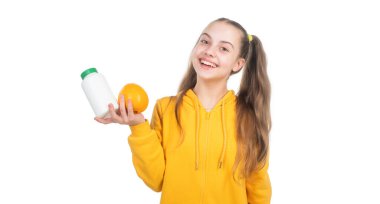 Çocuklar için coşkulu bir tablet. Mutlu kız, C vitamini organik gıda desteği sunuyor..