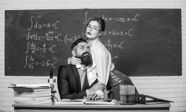 Desirable girl cuddle man. Teaching with passion. Resist temptation. Sexual temptation at workplace. Victim of circumstances. Teacher student flirting. Sexual provocation. Provoke sexual desire — Stock Photo, Image