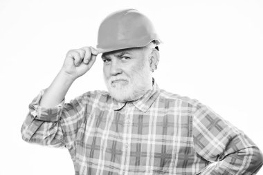 Tecrübeli mühendis. Tamir ya da yenileme. Ev tadilatı. Sakallı mühendis kask takıyor. Tamir konsepti. Mühendis mimar ya da müteahhit. Kıdemli mühendis ustabaşı. Tesisat servisi.