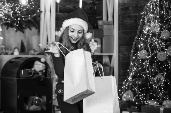 Best prices are here. big christmas sale. joy and happiness. congratulate her nearest. sincere greeting and wishes. companion of saint nicholas. Child shopper fashion. small girl go shopping — Stock Photo, Image