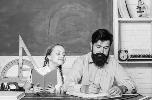 Lesson is finished. Man bearded pedagogue study together with kid. Study is fun. School teacher and schoolgirl. Task successfully done. Homeschooling with father. Help study. Discipline upbringing — Stock Photo, Image