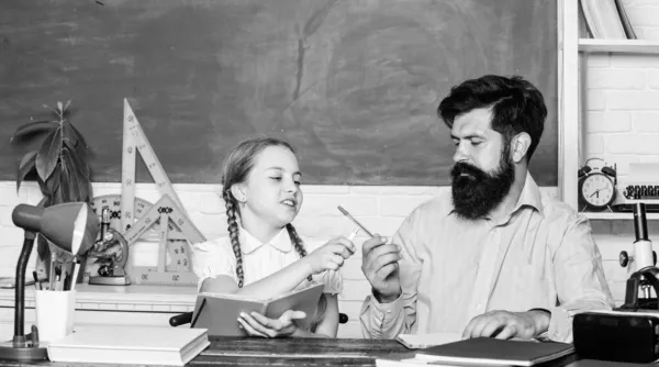 Education child development. back to school. bearded man teacher with small girl in classroom. knowledge day. Home schooling. daughter study with father. Teachers day. Childhood memories — Stock Photo, Image