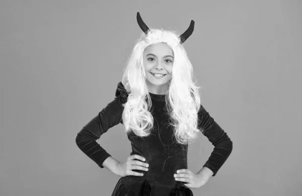 Happy devil child with long white hair wear horns costume of imp on halloween party, halloween costume — Stock Photo, Image