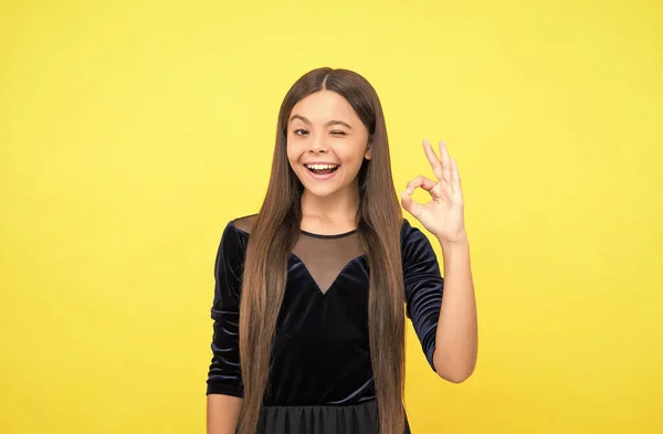 Everything is cool. Happy child show OK yellow background. Cool look of little girl. Hair salon. Fashion style. Trendy clothes for kids. Childrens day — Stock Photo, Image