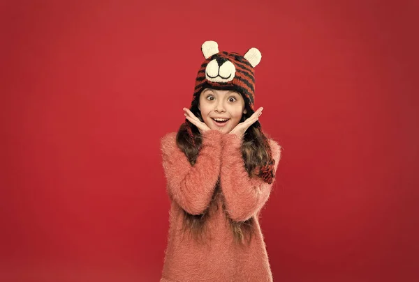 Bright memories. happy teen girl wear warm clothes. feel comfortable and cozy in any weather. winter holiday and vacation. kid in hat with ear flaps. child in knitted sweater. happy childhood — Stock Photo, Image