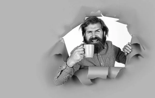Male smiling while drinking tea from cup, thirst — Stock Photo, Image