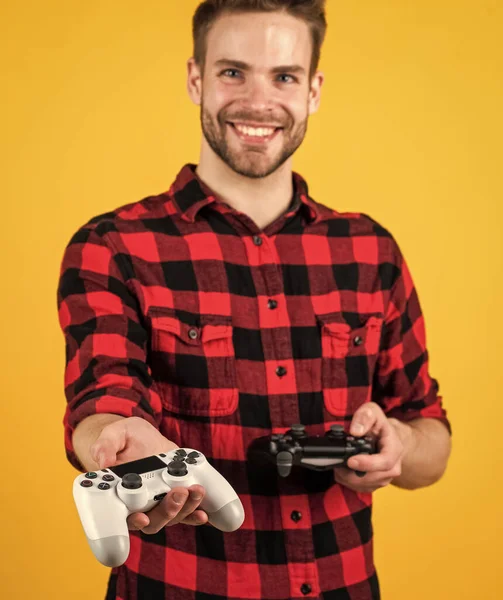 Premium Photo  Handsome man play with game console modern technology and  engineering video game console guy playing on console it is my hobby  inveterate gamer time for party fun