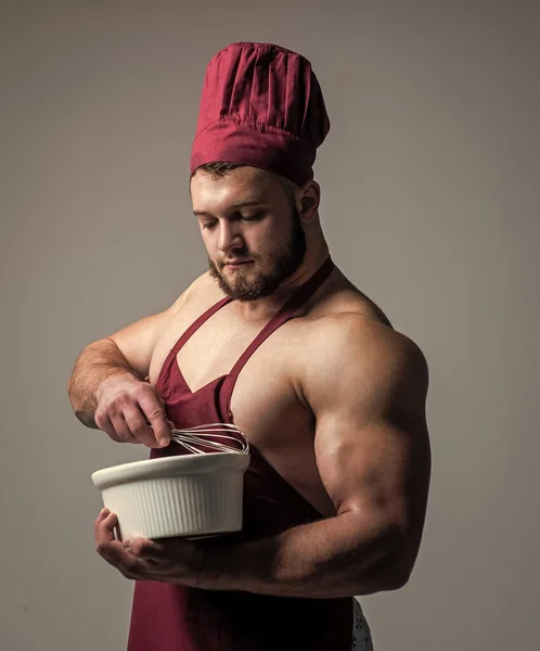 Homme De Cuisine Sexy En Tablier. Chef Musclé Sur Fond Noir. Régime  Sportif.