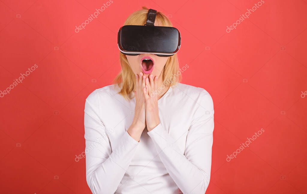 The woman with glasses of virtual reality. Woman wearing virtual reality goggles. Woman using virtual reality headset. VR science.