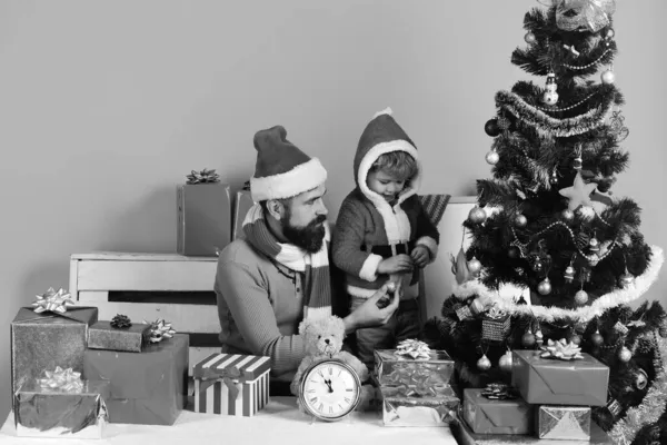 Boy and man with beard and serious faces — Stock Photo, Image