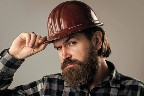 Enjoying his perfect beard. building and repairing. handsome man laborer. male worker in uniform — Stock Photo, Image