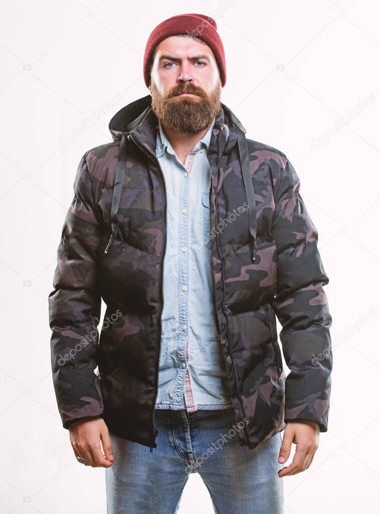Stylish and comfortable. Winter stylish menswear. Man bearded stand warm black jacket parka isolated on white background. Winter outfit. Hipster winter fashion. Guy wear hat and black winter jacket