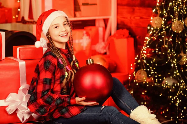 Spread love. Winter holiday. Christmas concept. Child fancy santa enjoy celebration new year. Small cute girl with big ball christmas tree. Christmas spirit. Decor shop. Favorite color. Red style — Stock Photo, Image