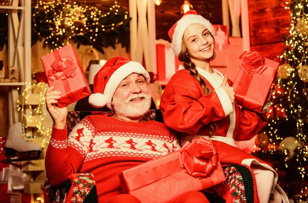For everyone. grandpa and grandchild at home. happy new year. xmas happiness and joy. Present for kid. father and daughter love christmas. family holiday weekend. Little girl with santa man — Stock Photo, Image