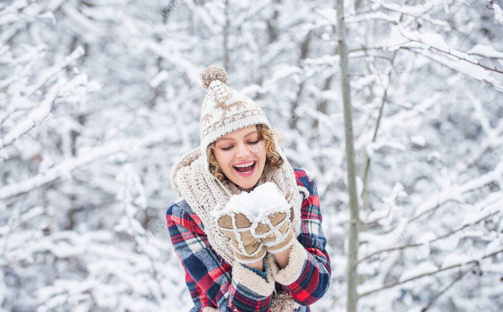 Winter admirer. Favorite season. Walk in snowy forest. Happy girl having fun outdoors. Christmas time. Winter outfit. Woman wear warm accessories stand in snowy nature. Winter fashion collection