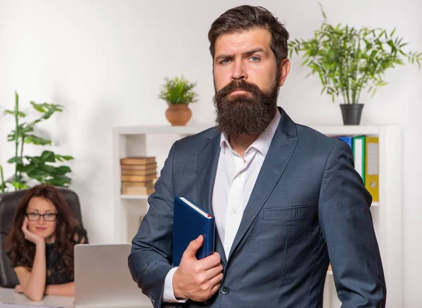 Serious man professional employer in suit stand in front woman employee in office, professionalism — Stock Photo, Image