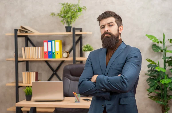 Confident brutal lawyer in businesslike suit at the office with copy space, business — Foto Stock