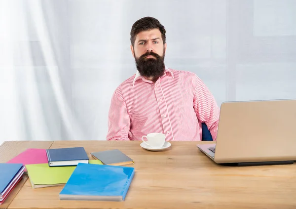 Serious guy working at office desk. Office work — Stock Photo, Image