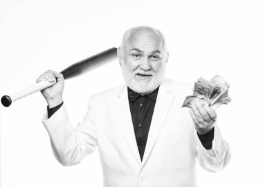 Kişisel güvenlik. Başarılı bir iş adamı. Acımasız iş hayatı. Raket ve baskın. Kingpin konsepti. Kara nakit para. Kıdemli adam nakit para ve beyzbol sopası tutuyor. Zenginlik refahı. Para karı