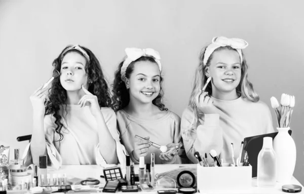 Happy girls doing makeup together. Sisterhood happiness. Cosmetics shop. Control oil. Apply lipstick. Prevent acne. Kids makeup. Skin care concept. Cosmetics for children. Beauty and fashion — Stock Photo, Image