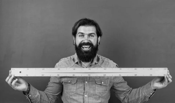 Man happy with size measured on ruler math tool, measuring length — Foto de Stock