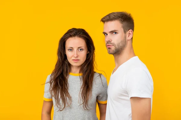 Sexy young couple in love on yellow background, love — ストック写真