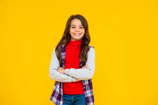 Smiling kid in casual clothes on yellow background. happy childhood. — Fotografia de Stock