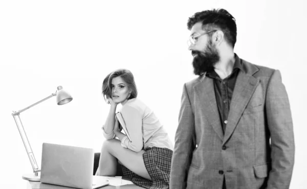 Sexy lady worker. Sexy personal secretary. Full of desire. Sexual fantasy. Woman fantasizing about coworker. Man bearded boss stand in front of sexy girl working laptop. Office manager or secretary — Stock Photo, Image