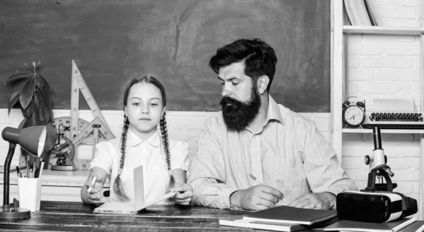 School teacher and schoolgirl. Talented pedagogue. Work together to accomplish more. Man bearded pedagogue. Homeschooling with father. Find buddy to help you study. Private lesson. Pedagogue skills — Stock Photo, Image