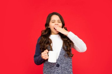 surprised man in tuxedo bow tie point finger on shopping bag for mens day. copy space.