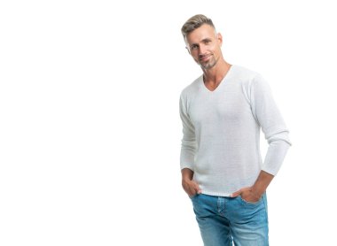 Angry guy shouting at alarm clock being in bed awake in morning, oversleeping