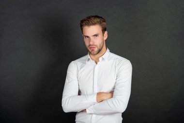 handsome ceo in shirt on black background, business