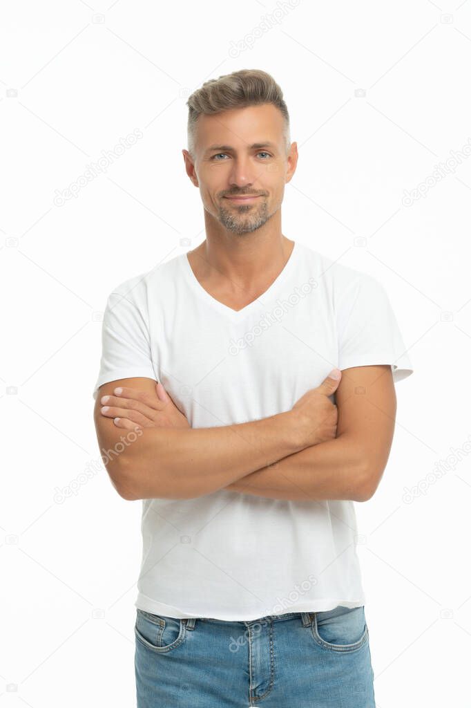 Confident handsome man in casual keep arms crossed isolated on white, confidence