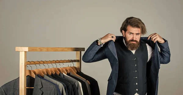 Bearded man collector vintage clothes showing formal suit, perfect fit concept — Stock Photo, Image