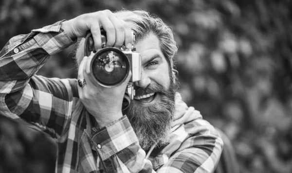 Photography in modern life. Hobby and professional occupation. Photographer use vintage camera. Bearded man hipster taking photo. Man with retro camera. Camera settings concept. Find perfect angle — Stock Photo, Image