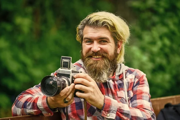 Real joy. bearded man hipster take photo. photo shooting outdoor. brutal man traveler with retro camera. photography in modern life. travel tips. professional photographer use vintage camera — Stock Photo, Image