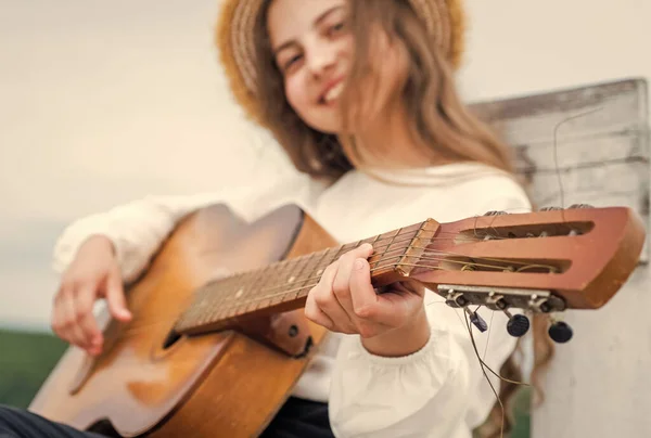 Follow your own style. feel the inspiration. cheerful kid with acoustic guitar. — Stock Photo, Image
