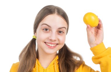 Vitamin ve diyet. Çocuk sağlıklı yiyecekler yiyor. Çocukluk sağlığı. turunçgiller.