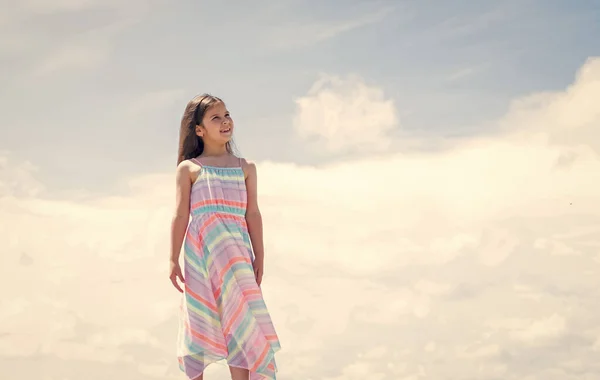 Pretty teen girl with long hair in dress, copy space, summer — Stock Photo, Image