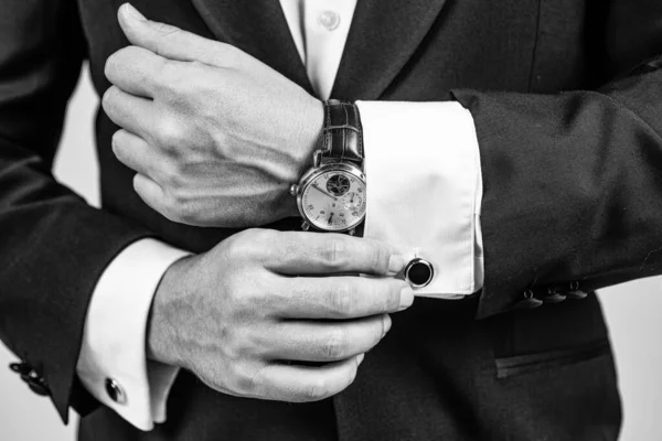 Modern horology. Wrist watch worn with formal suit. Portable timepiece. Time management. Horology concept. Professional punctuality. Business etiquette — Stock Photo, Image