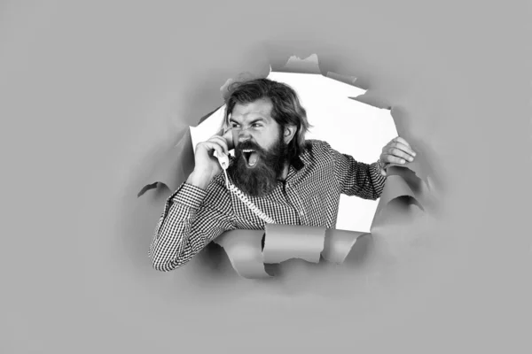 Conversation and communication. anger and aggression. deal with problem. angry shouting mature man. guy with beard speak on retro phone. brutal caucasian hipster with moustache — Stock Photo, Image