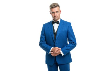 Papyonlu, mavi takım elbiseli olgun bir adam. Beyaz iş adamı. Takım elbise lideri.