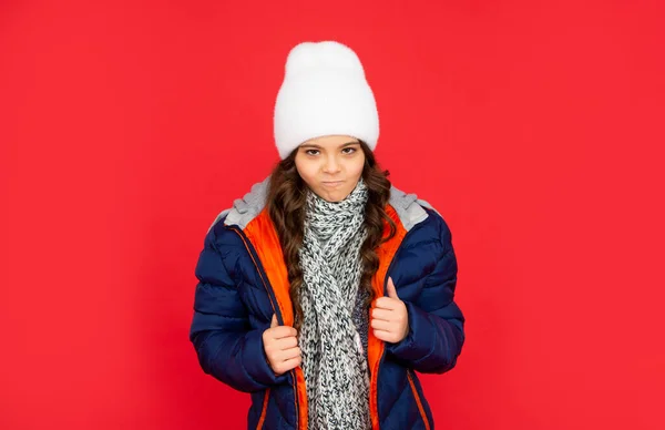 Portrait of child wearing warm clothes with scarf. express emotion. winter fashion. naughty kid — Stock Photo, Image