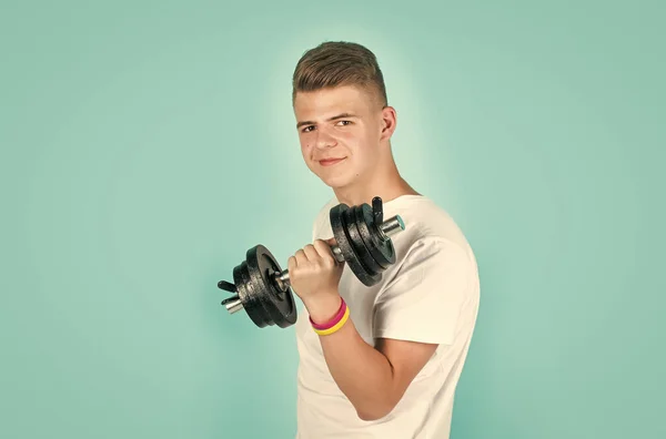 He has power. healthy lifestyle. concept of fitness. child workout with dumbbell. — Stock Photo, Image