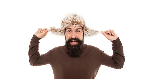 Happy brutal hipster with beard in earflape hat isolated on white background, face — Stock Photo, Image