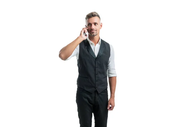 Manager in semi-formele pak vest praten op mobiele telefoon geïsoleerd op wit — Stockfoto