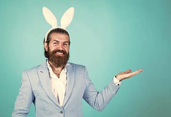 Man in bunny ears. rabbit man wear hare ears. bunny hunt begins. happy hipster with beard. Man in rabbit ears. Preparation for Easter. concept of egg hunt. Easter celebration concept. Spring holidays