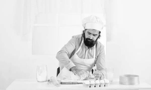 Skilled baker use kitchen utensils for cooking. male chef in hat prepare healthy meal. handsome man with beard moustache cooking food. professional restaurant cook baking. Fragrance of deliciousness — Stock Photo, Image