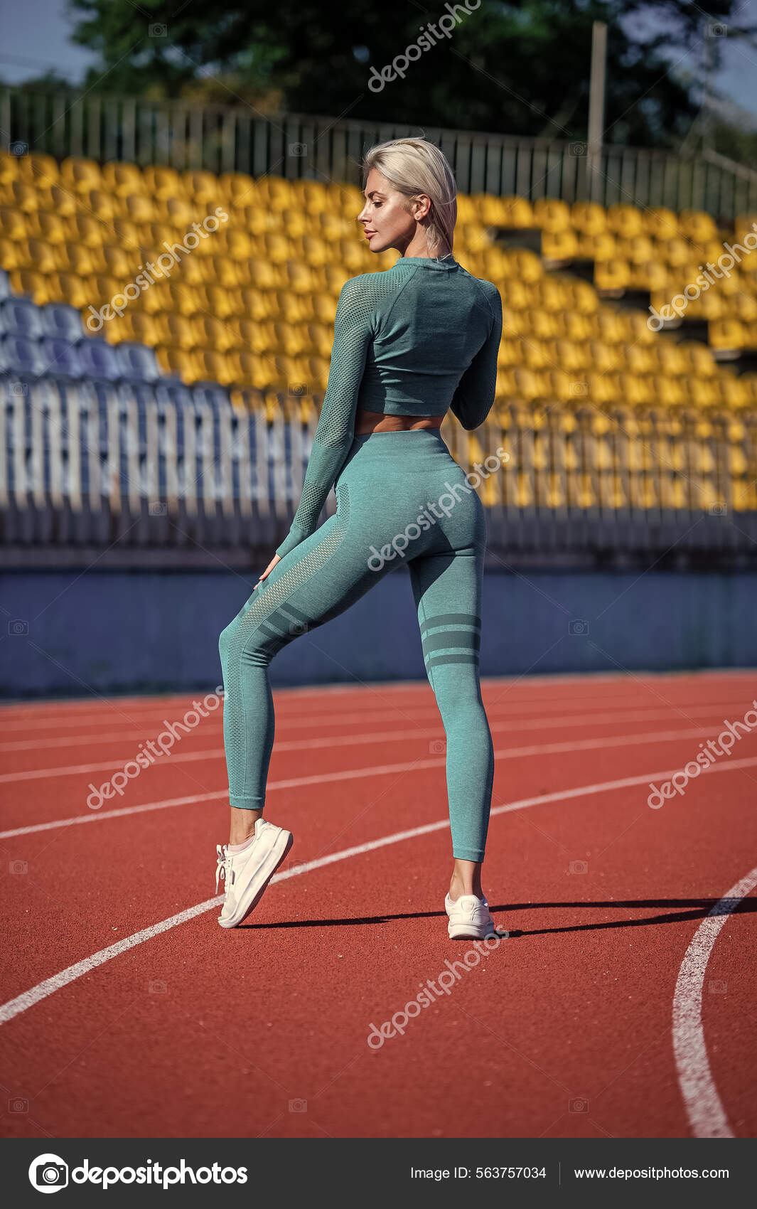 Sexy woman athlete in sportswear has fit body ass relax on stadium after  sport workout, body shape Stock Photo by ©stetsik 563757034