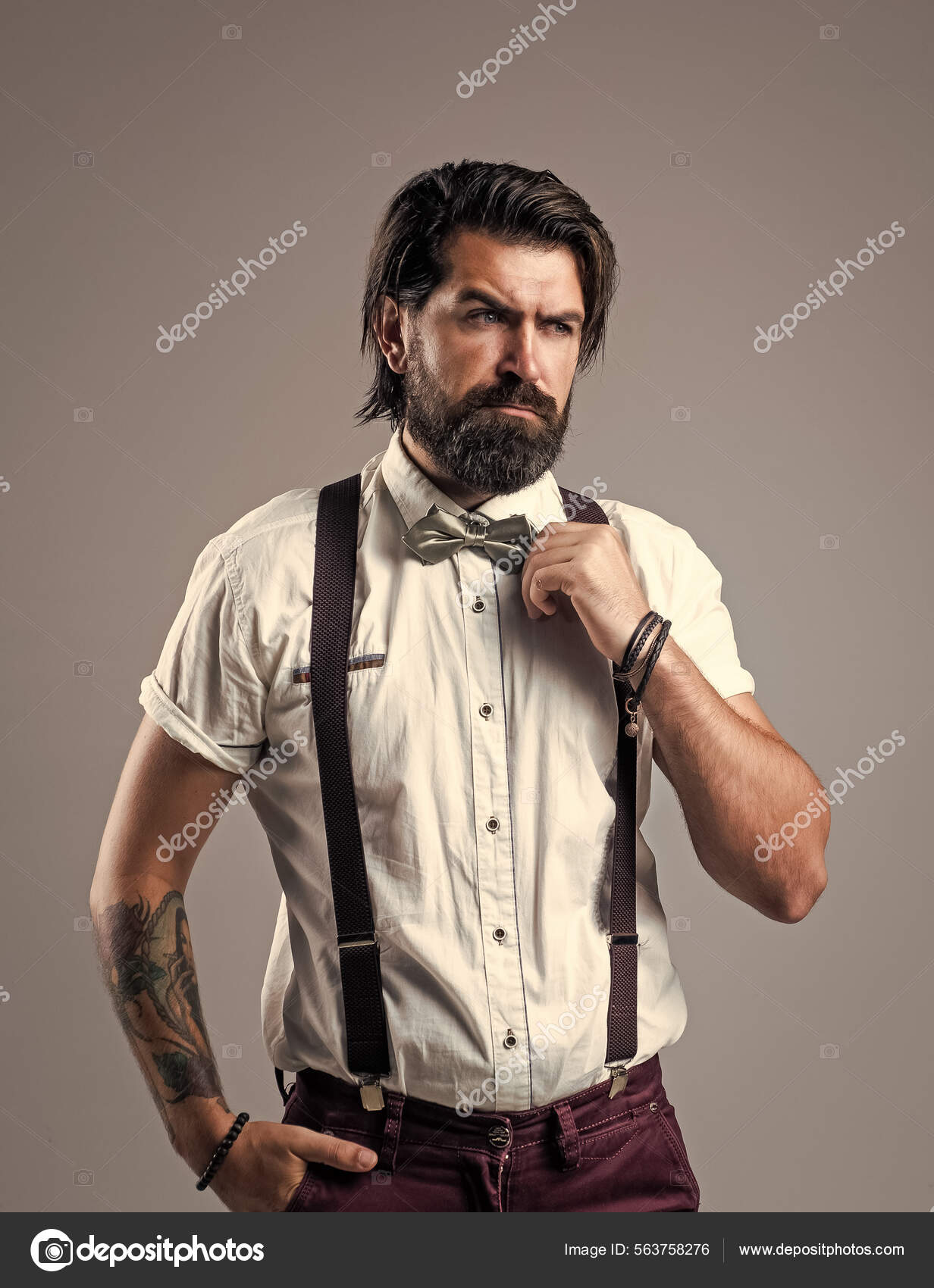 Handsome macho. formal party dress code. old fashioned bearded hipster.  hairdresser concept. brutal handsome man with moustache. mature barber in  retro style. masculinity and charisma Stock Photo by ©stetsik 563758276